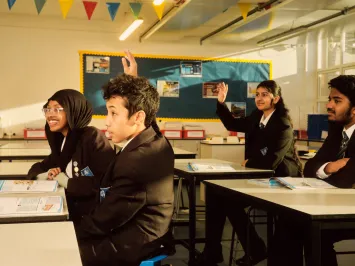 Pupils raising hands