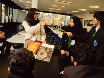 Teacher in class with students