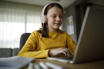 Primary school girl studying from home