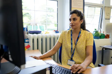 Teacher at her desk