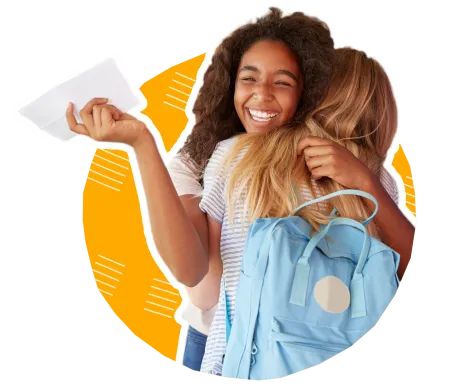 Student receiving grades and hugging friend