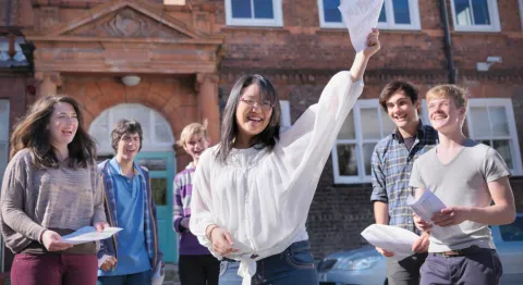 Teens celebrating exam results