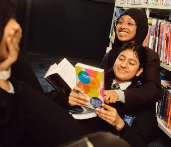 Students in library together